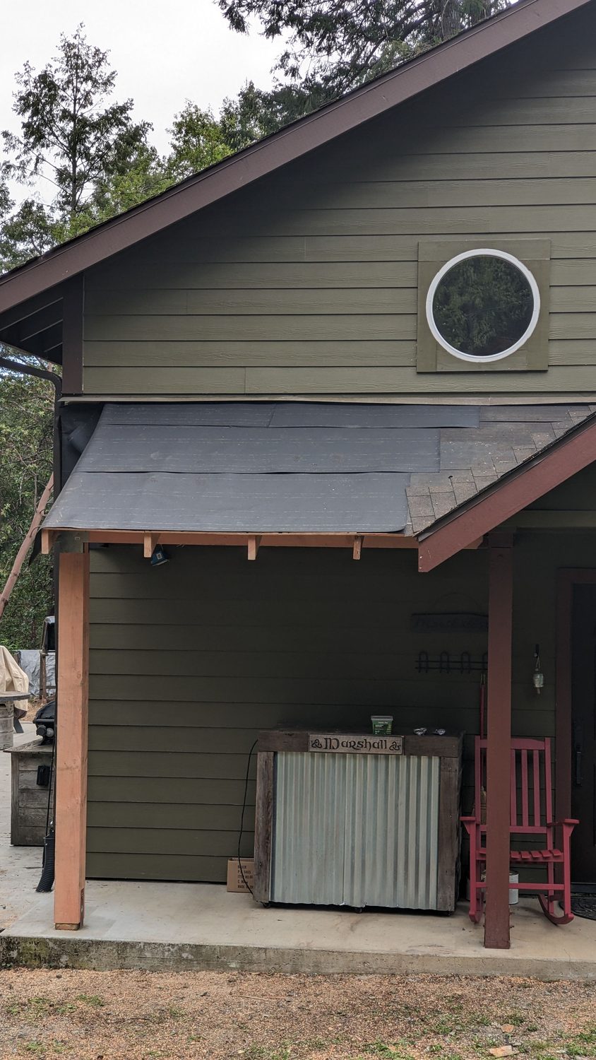 Repair in progress with new roof underlayment and shingles being installed