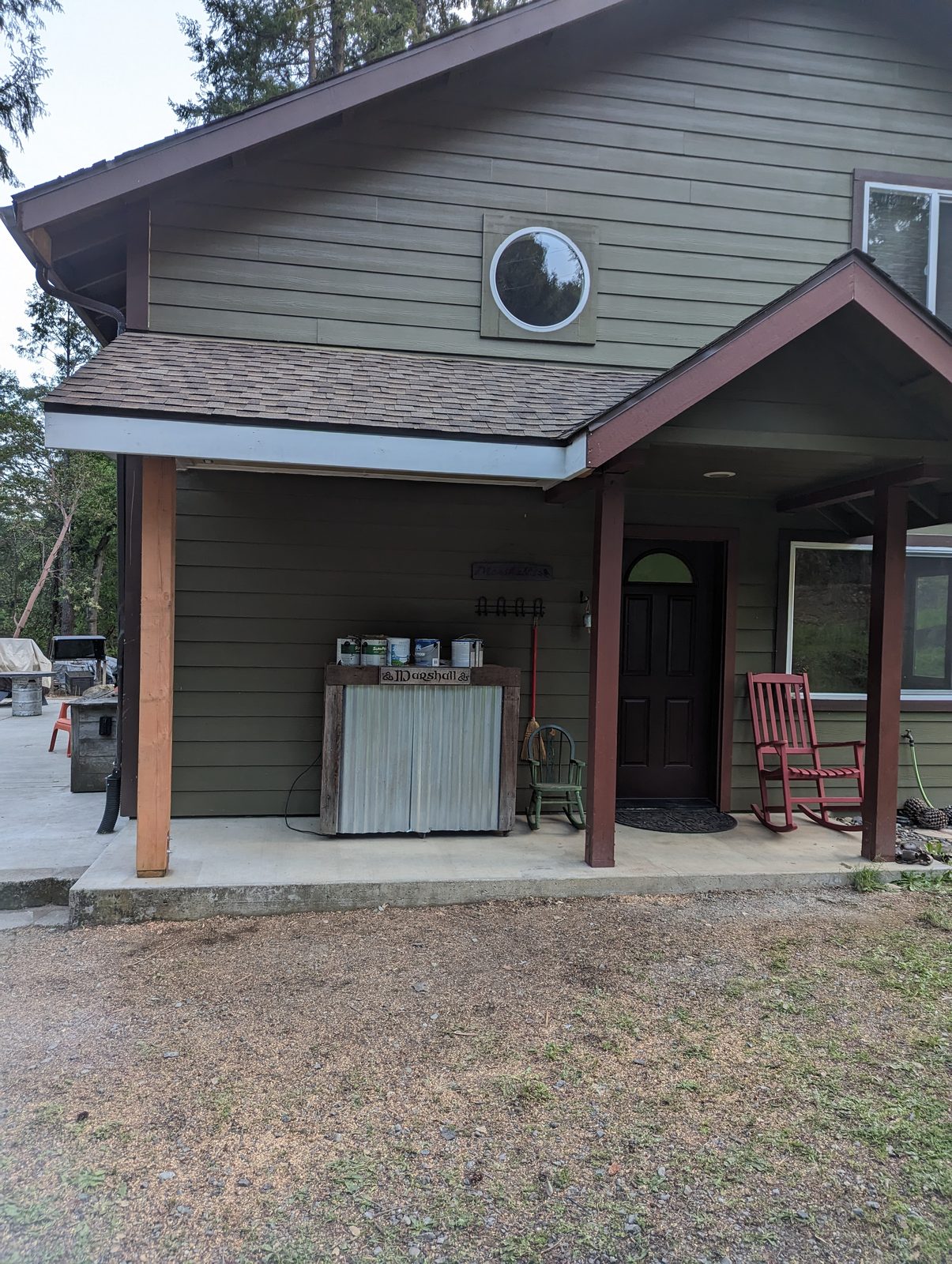 Restored green craftsman home with new lap siding, soffit, and fascia after storm damage repair by NorCal Exterior