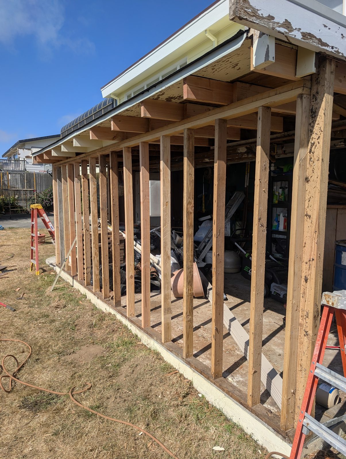 Wall framing fully exposed during a NorCal Exterior siding replacement project, the moment when underlying issues get addressed before new siding goes on