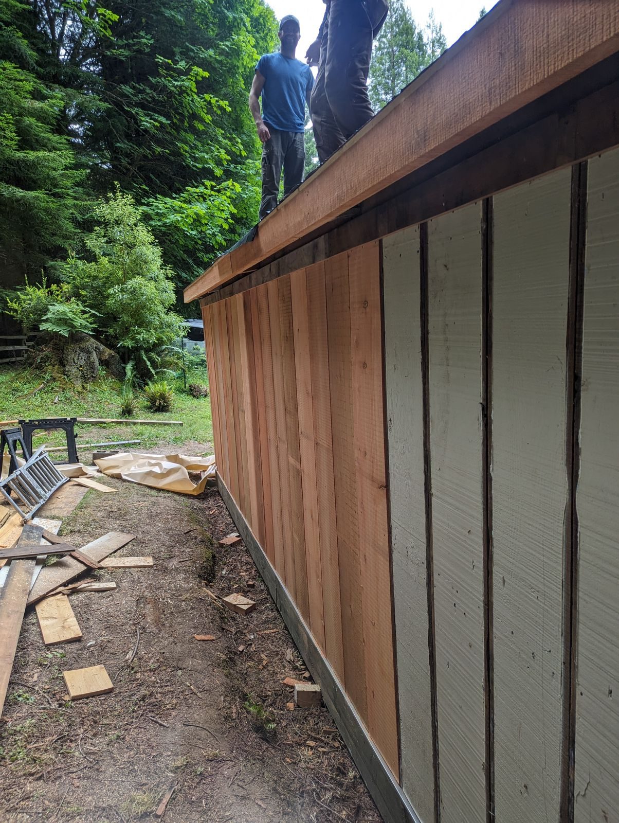 Finished dark-stained wood siding on a structure by NorCal Exterior, serving Blue Lake and inland Humboldt