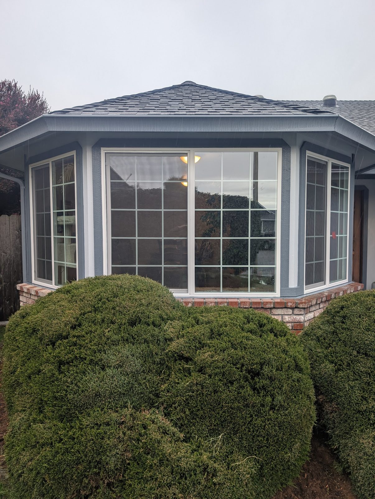 Energy-efficient bay window with insulated frames on a Humboldt County home, replaced by NorCal Exterior